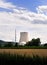 Atomic nuclear power station meadow grass blue sky