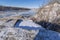 Atop cliff overlooking frozen mississippi river