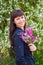 Atractive girl with field flowers