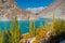 Attabad lake in a beautiful autumn season with Passu cathedral mountains massif in background, Karakoram mountains range in