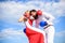 Attack is best defence. Defend your opinion in confrontation. Man and woman fight boxing gloves sky background. Female