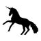 Attacking unicorn silhouette. Black mythical wild horse with magic horn standing on hind legs.