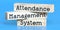 Attendance management system - words on wooden blocks