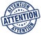 Attention blue grunge round stamp