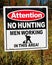 An attention no hunting, men working sign