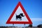 Attention warthogs crossing, road sign in Namibia
