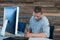 Attentive businessman working at desk