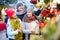 Attentive parents with teenage girl at counter with Poinsettia and floral decorations