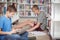 Attentive schoolboys studying in library