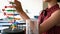 Attentive schoolgirl experimenting molecule model in laboratory