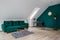 Attic living room with emerald details