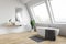 Attic white bathroom corner, tub and sink