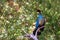 Attica zoo park. Exotic rare colorful jungle bird with plume in leafy background