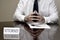 Attorney Businessman at Desk with Papers and Card Making Hand Gestures