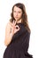 Attracive woman in black showing ok sign