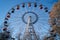 Attraction for children and adults, Ferris wheel in the summer Park.