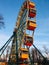 Attraction Ferris wheel and spring sky