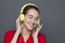 Attractive 20s girl for trendy headphones concept