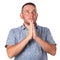 Attractive adult man with stubble in summer shirt praying