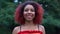 Attractive afro-american female teenager smiling camera, youth beauty, health