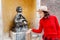 Attractive asian woman with fountain in Siena, Italy