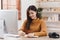 Attractive Asian woman resting comfortable living room and using desktop computer, Relax, Sofa, Lifestyle