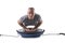 Attractive athletic young man working out with balance board