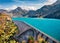 Attractive autumn scene of Auvergne-Rhone-Alpes, France, Europe. Bright morning view of Roselend lake/Lac de Roselend. Beauty of n