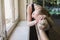 Attractive ballerina warming up in ballet class