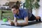 Attractive beared man doing plank exercise at home during quarantine. Fitness is the key to health