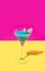 A attractive blue cocktail with a white flower against bright lovely magenta background and warm yellow bottom. Creative copy