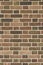 Attractive brown brick wall texture in Flemish bond brickwork pattern