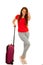 Attractive busienss woman with suitcase - business travel studio
