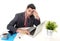 Attractive businessman in suit and tie working in stress at office computer laptop looking desperate and frustrated in work and bu