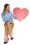 Attractive businesswoman holds valentine day heart and points to side