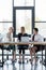 attractive businesswomen using laptop at meeting