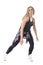 Attractive caucasian woman dancer doing jazz dance aerobics in street style clothes.