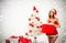 Attractive Christmas girl in a sexual lingerie. Naked body. Seasonal christmas holidays sale discounts. Woman in a sexy