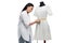 Attractive concentrated asian tailor measuring stylish white dress on dummy