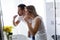 Attractive couple brushing teeth in morning together