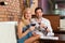 Attractive couple drinking red wine in bar