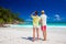 Attractive couple enjoying sunny day at Maia Beach. Mahe, Seychelles