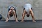 An attractive couple in the gym engaging in various stretching exercises together, showcasing their dedication to