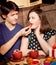 Attractive couple have fun in the kitchen at Valentine day