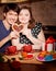 Attractive couple have fun in the kitchen at Valentine day