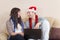 Attractive Couple with Santa Hat Together in Love