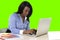 Attractive and efficient black ethnicity woman at office isolated green chroma key screen