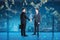 Attractive european businessmen shaking hands in interior with digital dollar bill on blurry tech background with binary coding.