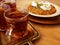 Attractive evening table , with fragrant tea and Turkish baklava called kunafa