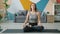 Attractive female adult working out in lotus position at home sitting on yoga mat